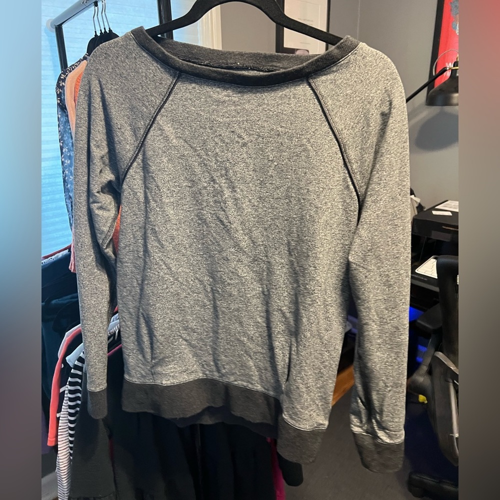 Unlabeled sweatshirt- no size listed. So so soft. Feels like an expensive brand